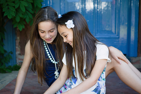Sisters get their head together