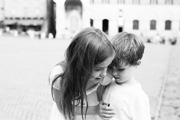 Siblings whisper